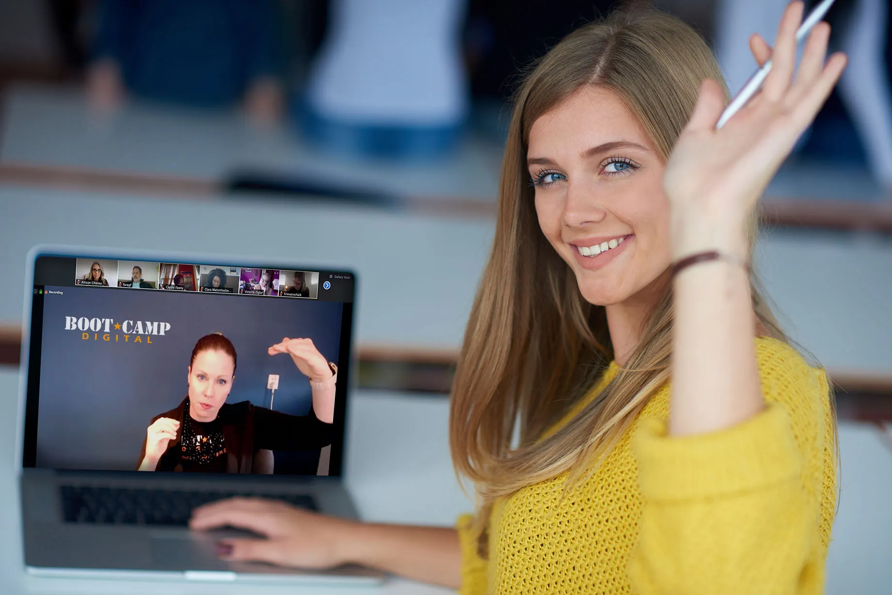 Woman on Laptop Waving Online Classroom
